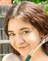 Lily Summers get wet in the garden in sexy bikini and nude showing her hairy vagina and puffy nipples