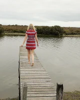 Blonde Melaina in green bikini flashing in the pier