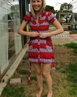 Blonde Melaina in green bikini flashing in the pier