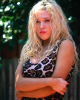 Busty Sam in pink bikini