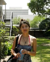 Busty latin baby Adriene Macedo is in the pool in sexy dark red bikini