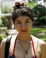 Busty latin baby Adriene Macedo is in the pool in sexy dark red bikini