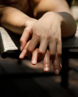 Busty latin baby Adriene Macedo is in the pool in sexy dark red bikini