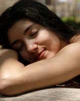 Busty latin baby Adriene Macedo is in the pool in sexy dark red bikini