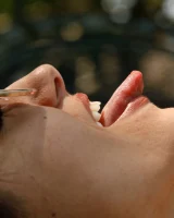 Busty latin baby Adriene Macedo is in the pool in sexy dark red bikini