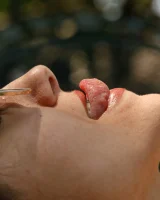 Busty latin baby Adriene Macedo is in the pool in sexy dark red bikini