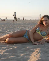 Amazing Anastasia Black is walking on the street and beach in her sexy bikini