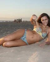 Amazing Anastasia Black is walking on the street and beach in her sexy bikini