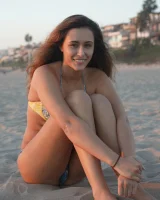 Amazing Anastasia Black is walking on the street and beach in her sexy bikini