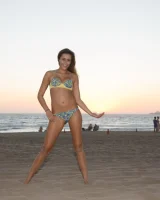 Amazing Anastasia Black is walking on the street and beach in her sexy bikini