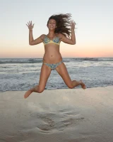 Amazing Anastasia Black is walking on the street and beach in her sexy bikini