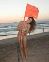 Amazing Anastasia Black is walking on the street and beach in her sexy bikini