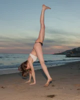 Amazing Audrey Star is at the beach in bikini in the evening