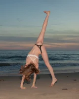 Amazing Audrey Star is at the beach in bikini in the evening