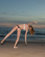 Amazing Audrey Star is at the beach in bikini in the evening