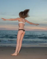 Amazing Audrey Star is at the beach in bikini in the evening