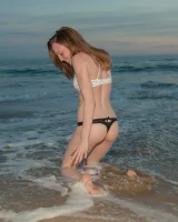Amazing Audrey Star is at the beach in bikini in the evening