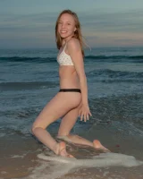 Amazing Audrey Star is at the beach in bikini in the evening