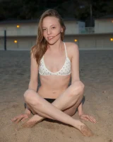 Amazing Audrey Star is at the beach in bikini in the evening