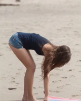 Sexy baby Coco Rose is on the beach in white micro bikini