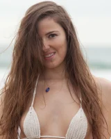 Sexy baby Coco Rose is on the beach in white micro bikini