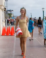 Dubsie Liftoff is on the beach in sexy summer dress, she poses in sexy blue bikini and flashes hairy pussy and erected nipples