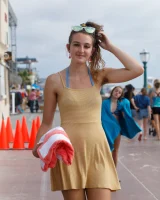 Dubsie Liftoff is on the beach in sexy summer dress, she poses in sexy blue bikini and flashes hairy pussy and erected nipples