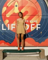 Dubsie Liftoff is on the beach in sexy summer dress, she poses in sexy blue bikini and flashes hairy pussy and erected nipples