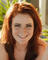 Busty Emmy Sinclair in red bikini is good on the bun