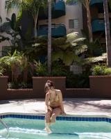 Pool girl Hannah Kinney is sexy in bikini