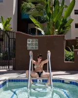 Pool girl Hannah Kinney is sexy in bikini