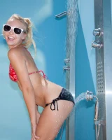 Las Vegas blonde baby Issy Mai caught by the pool in bikini