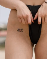 Busty chick Jade Baker is sexy skateboarder in cut tiny jeans shorts and fantastic baby in black bikini on the beach