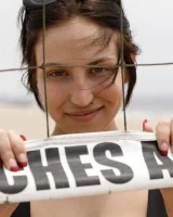 Busty chick Jade Baker is sexy skateboarder in cut tiny jeans shorts and fantastic baby in black bikini on the beach