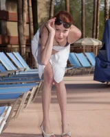 Sexy girl Kimmy Diedrick makes sexy bikini poses in the pool