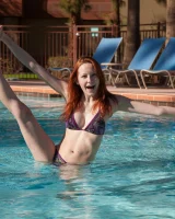Sexy girl Kimmy Diedrick makes sexy bikini poses in the pool