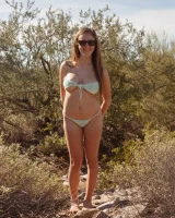 Busty chick Rochelle Safford is at the nature in sexy micro bikini