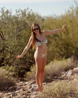 Busty chick Rochelle Safford is at the nature in sexy micro bikini