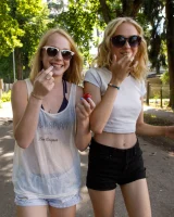 Two young sexy blonde hotties Rune Kimele and Bernie Svintis are walking in the city and changing in bikini in the forest