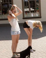 Two young sexy blonde hotties Rune Kimele and Bernie Svintis are walking in the city and changing in bikini in the forest