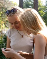 Two young sexy blonde hotties Rune Kimele and Bernie Svintis are walking in the city and changing in bikini in the forest