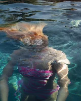 Exciting Samantha Rone is showing perfect body in bikini in the pool