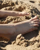 Amateur babe Sloan Kendricks enjoys a day on the beach modeling her swimsuits