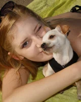 Amateur babe Sloan Kendricks enjoys a day on the beach modeling her swimsuits