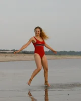 Hottie in a sexy swimsuit Sofia Orlova getting dirty on the beach