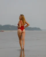 Hottie in a sexy swimsuit Sofia Orlova getting dirty on the beach