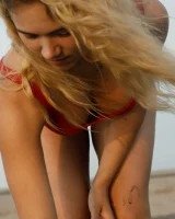 Hottie in a sexy swimsuit Sofia Orlova getting dirty on the beach