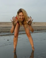 Hottie in a sexy swimsuit Sofia Orlova getting dirty on the beach