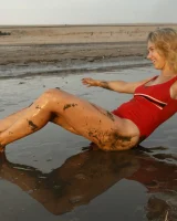 Hottie in a sexy swimsuit Sofia Orlova getting dirty on the beach
