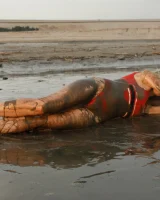 Hottie in a sexy swimsuit Sofia Orlova getting dirty on the beach